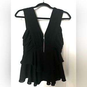 Express Black, Flirty, Ruffle Tank with a Front Zipper.